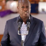 Rigathi Gachagua speaking at a political rally, addressing supporters with a determined expression.