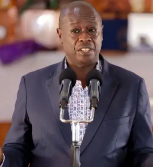 Rigathi Gachagua speaking at a political rally, addressing supporters with a determined expression.