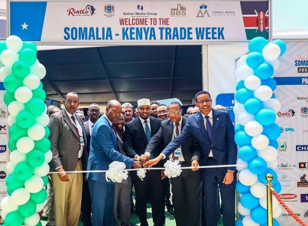 Kenyan and Somali officials cutting a ribbon at the Somalia-Kenya Trade Week event in Nairobi, symbolizing stronger economic ties between the two nations.