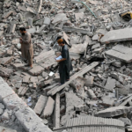 Emergency responders and police secure the site of a reported explosion near Sharafi Goth in Karachi, Pakistan, as tensions escalate with India.