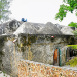 EACC officials inspecting the grounds of the 700-year-old Kongo Mosque in Kenya amid a halted land grab attempt.
